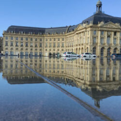 Bordeaux, France - November 20, 2021: The mirror of the quay in front of the Place Royale (Place Bourse). This water mirror , making it the largest water mirror in the world.